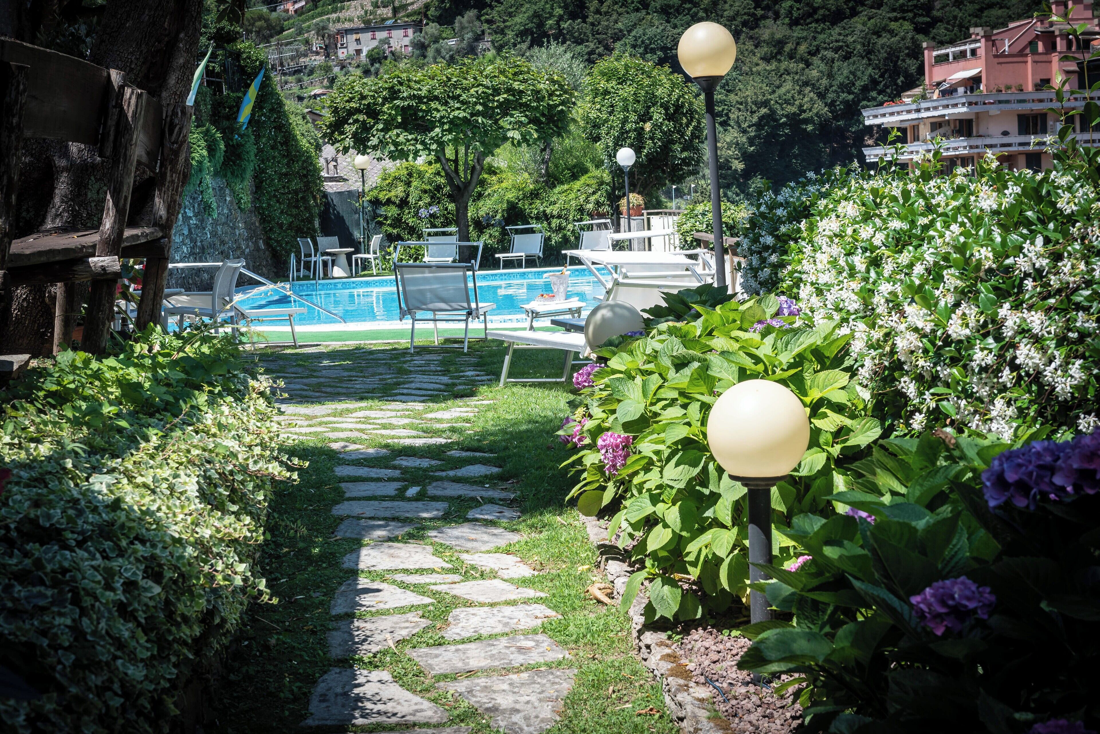 Seasonal outdoor pool, pool umbrellas, pool loungers