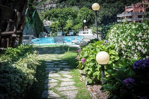 Seasonal outdoor pool, pool umbrellas, sun loungers
