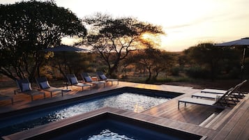 Outdoor pool, pool umbrellas, sun loungers