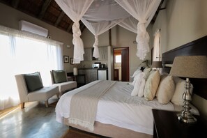 Standard Double Room | Premium bedding, memory foam beds, minibar, in-room safe - Tshukudu Game Lodge (Hoedspruit)