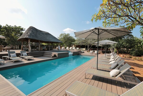 Outdoor pool, pool umbrellas, pool loungers