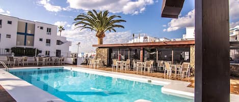 Outdoor pool, open 10 AM to 7 PM, pool umbrellas, sun loungers