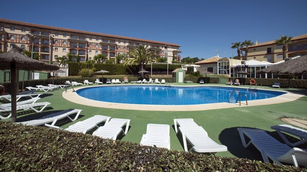 Seasonal outdoor pool, pool umbrellas, pool loungers