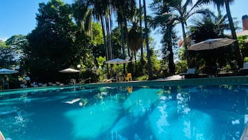 Outdoor pool, open 8:00 AM to 9:00 PM, pool umbrellas, pool loungers