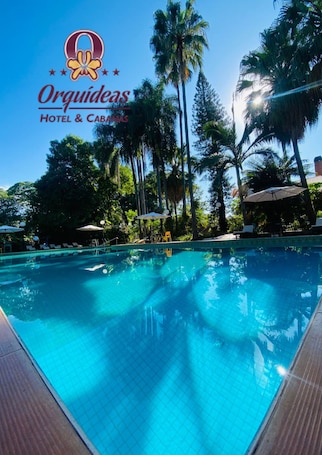 Outdoor pool, open 8:00 AM to 9:00 PM, pool umbrellas, sun loungers