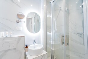 Shower, towels, soap, shampoo