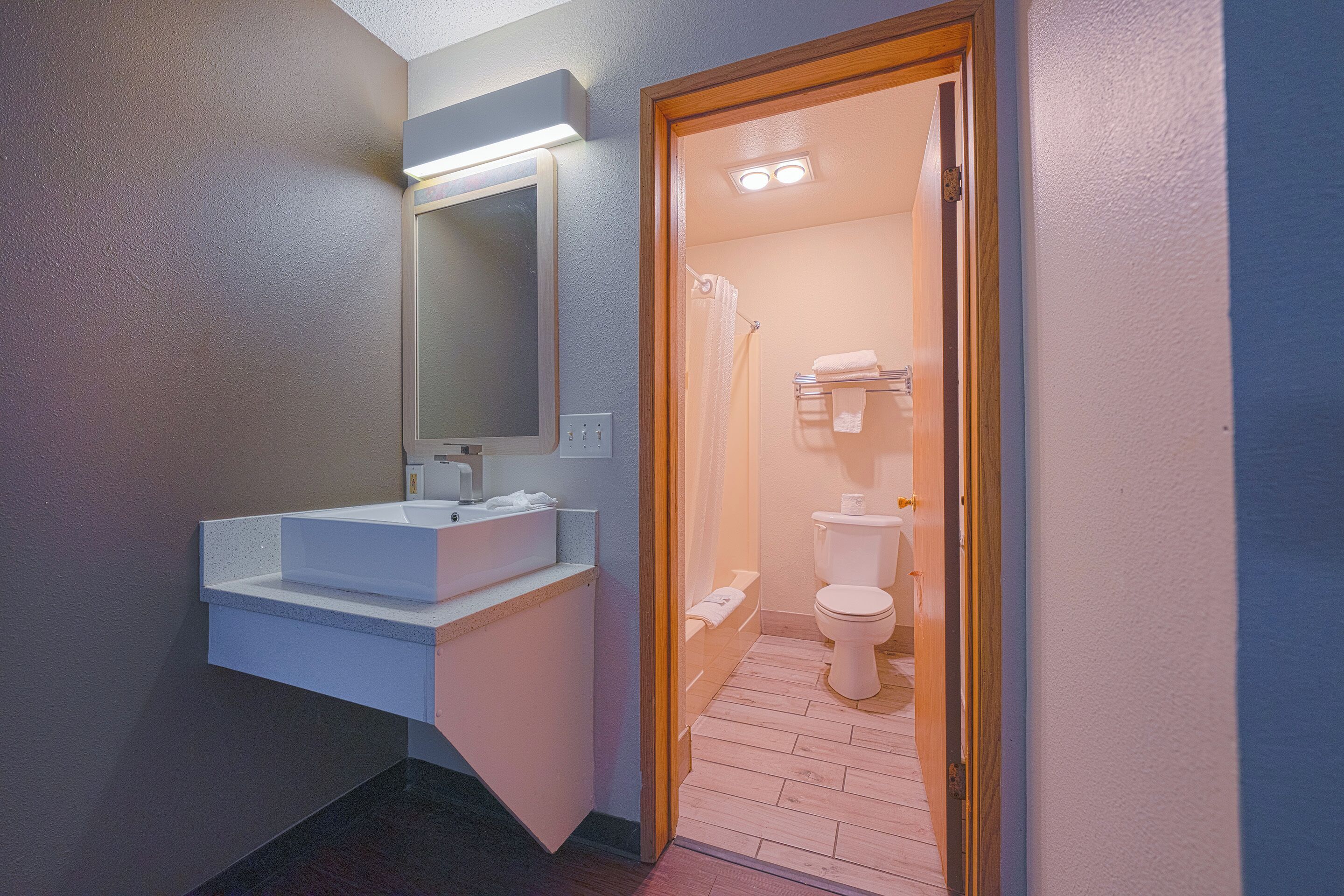 Premium Room, 2 Queen Beds, Kitchenette | Bathroom | Free toiletries, hair dryer, towels, soap