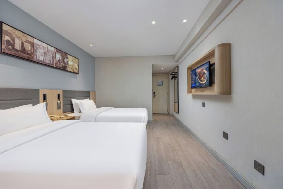 In-room safe, desk, blackout curtains, iron/ironing board (on request)