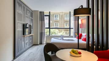 Desk, blackout drapes, soundproofing, iron/ironing board