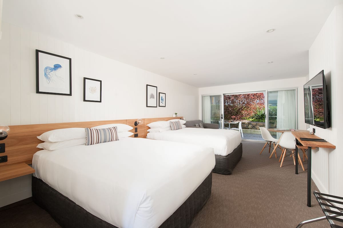 Down duvets, Select Comfort beds, desk, blackout curtains