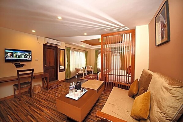 32-inch flat-screen TV with cable channels, TV, MP3 dock