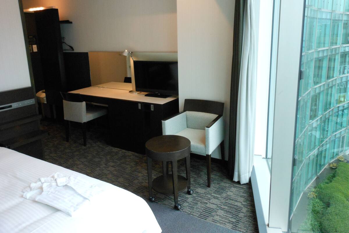 In-room safe, desk, blackout curtains, iron/ironing board (on request)