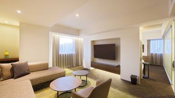 1 Bedroom Suite up to 6 Guests | Living area | 40-inch flat-screen TV with digital channels, TV