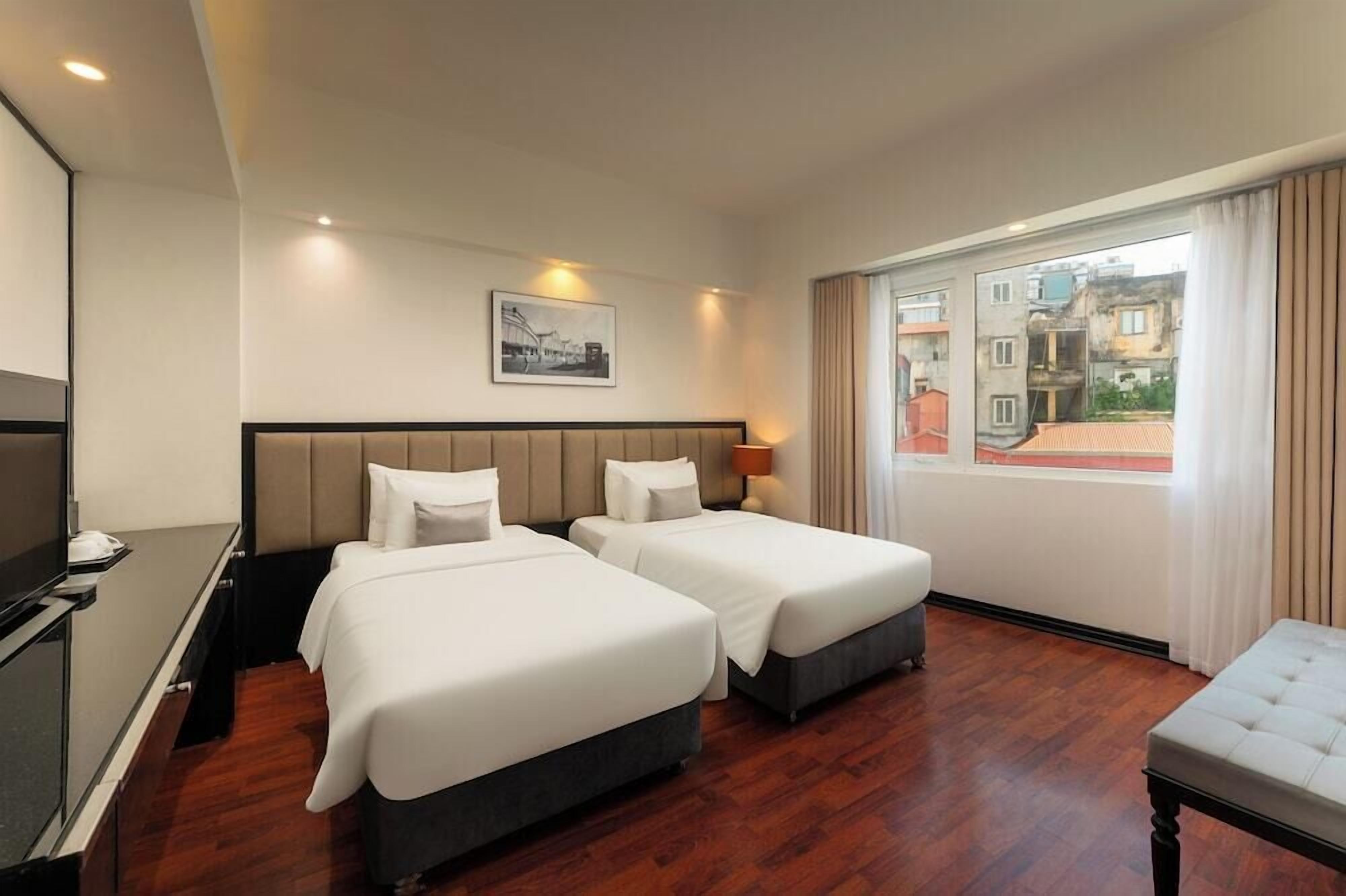 Premium bedding, memory-foam beds, minibar, in-room safe
