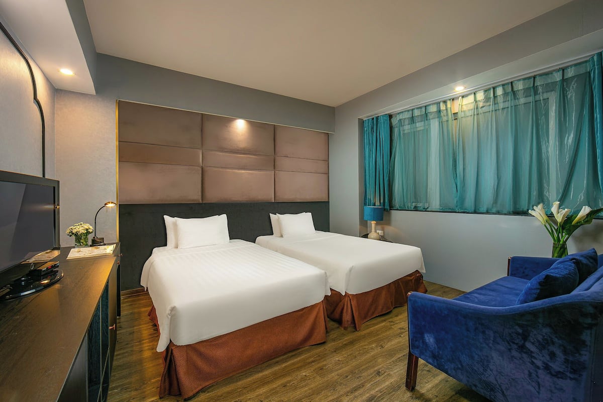 Deluxe kamer, 1 twee- of 2 eenpersoonsbedden | Luxe beddengoed, bedden met traagschuimmatras, een minibar