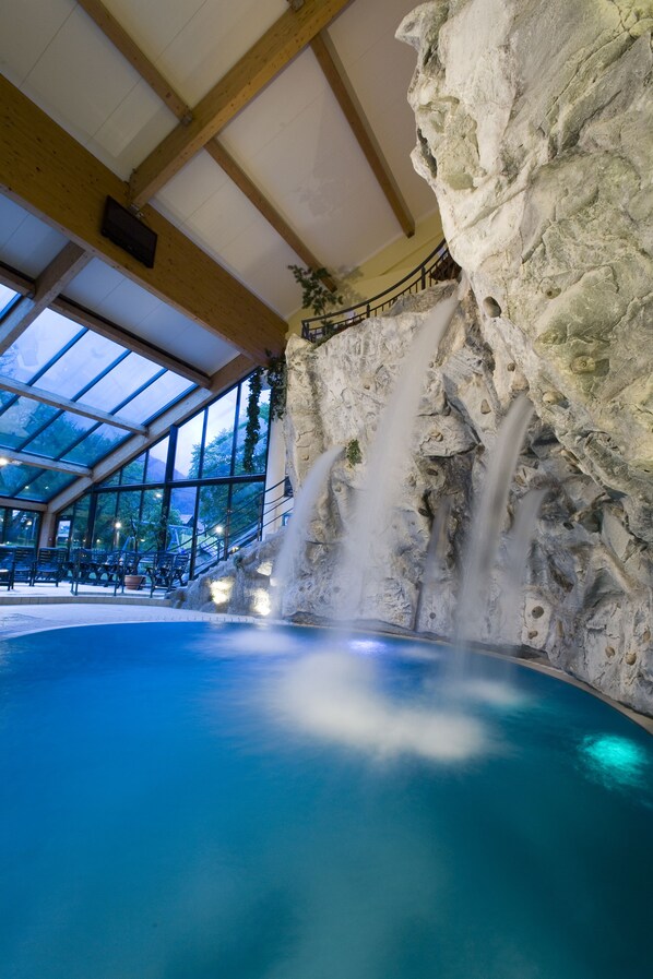 Indoor pool, outdoor pool, pool umbrellas, pool loungers