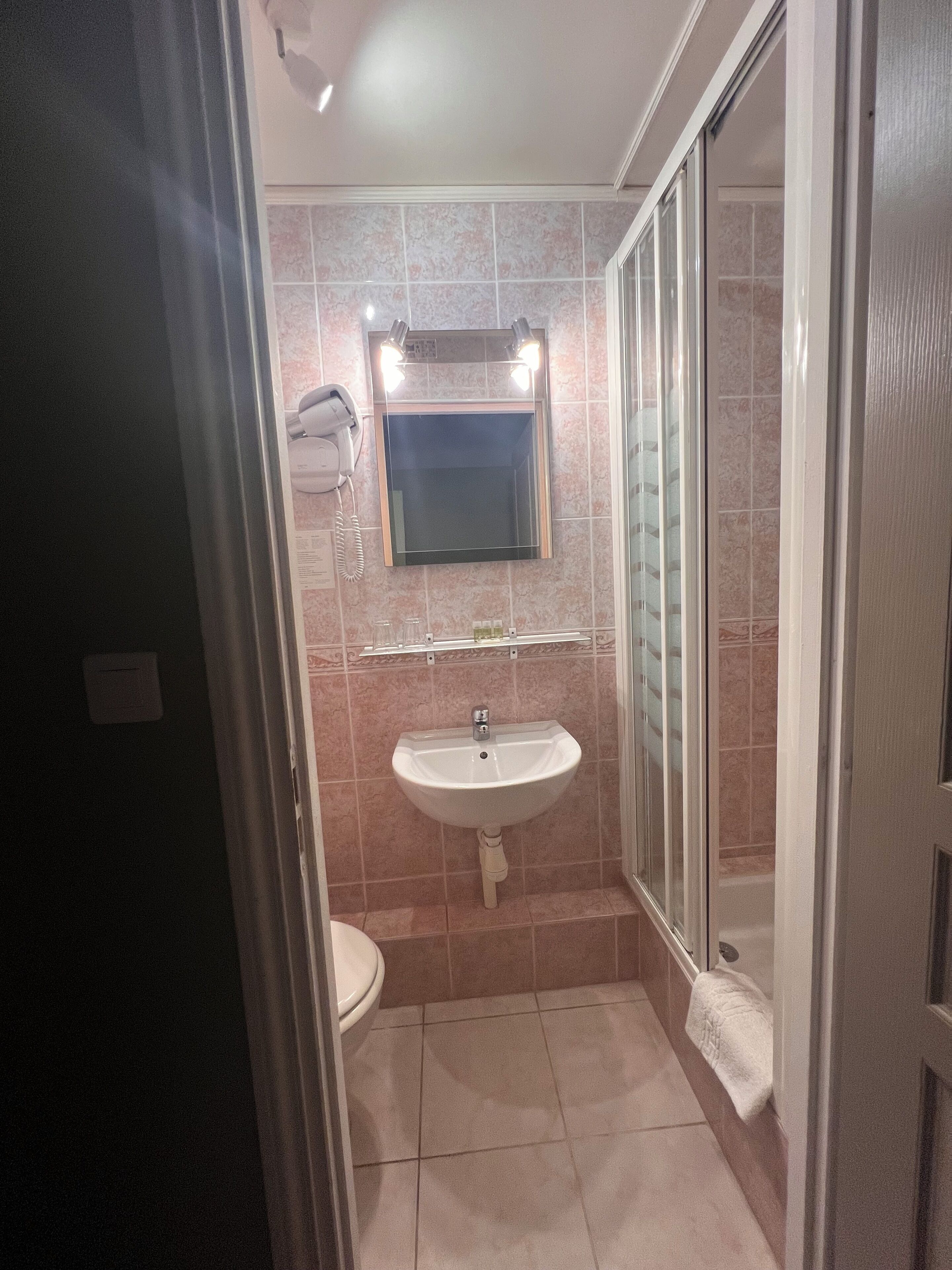superior triple room | bathroom | free toiletries, hair dryer, towels, soap