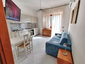 Departamento, 1 habitación | Cocina privada | Refrigerador con congelador, horno y parrilla de estufa 