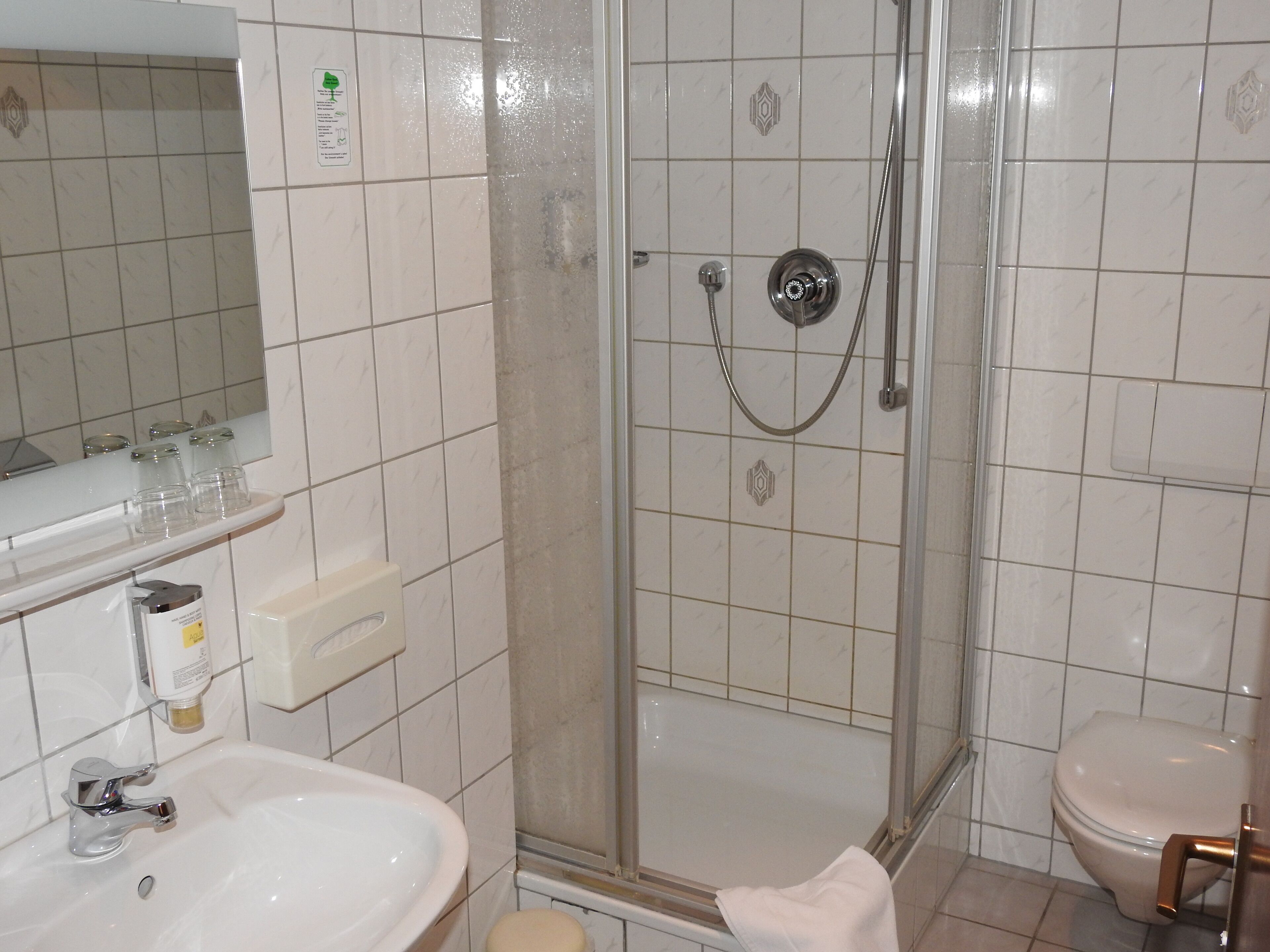 shower, hair dryer, bathrobes, slippers