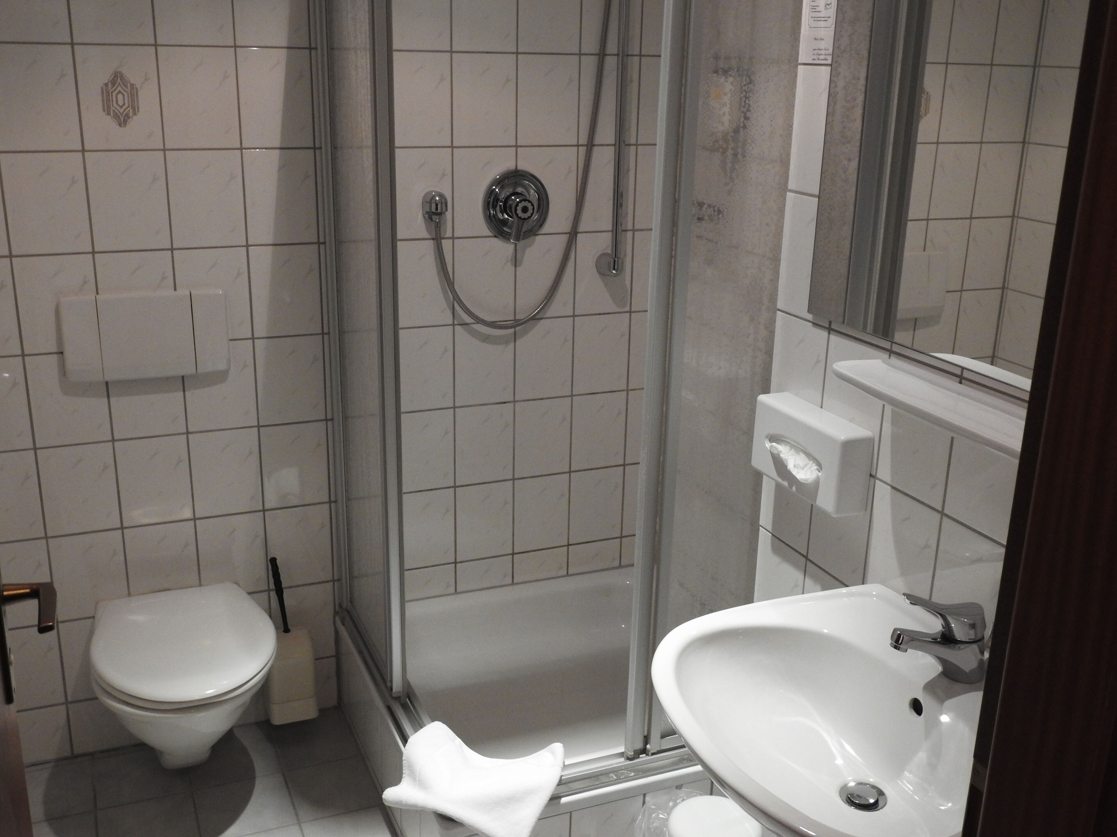 shower, hair dryer, bathrobes, slippers