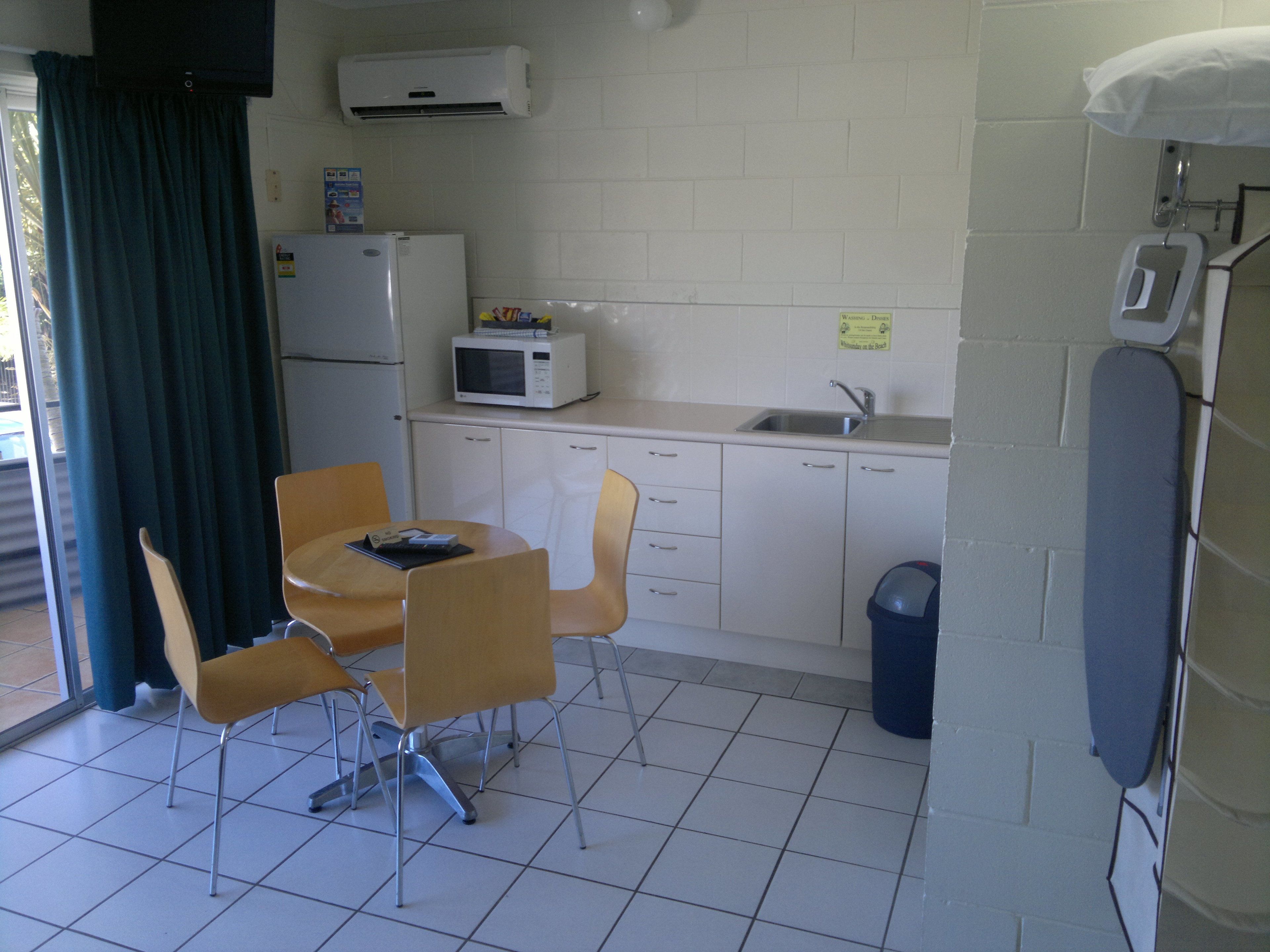 full-sized fridge, microwave, coffee/tea maker, electric kettle