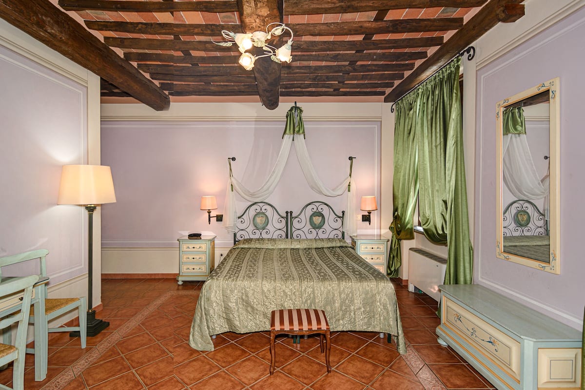 Junior Suite, 1 Bedroom | Minibar, in-room safe, desk, iron/ironing board