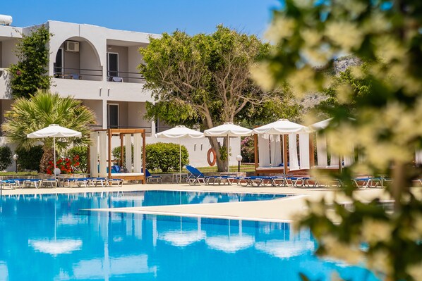 2 outdoor pools, pool umbrellas, pool loungers