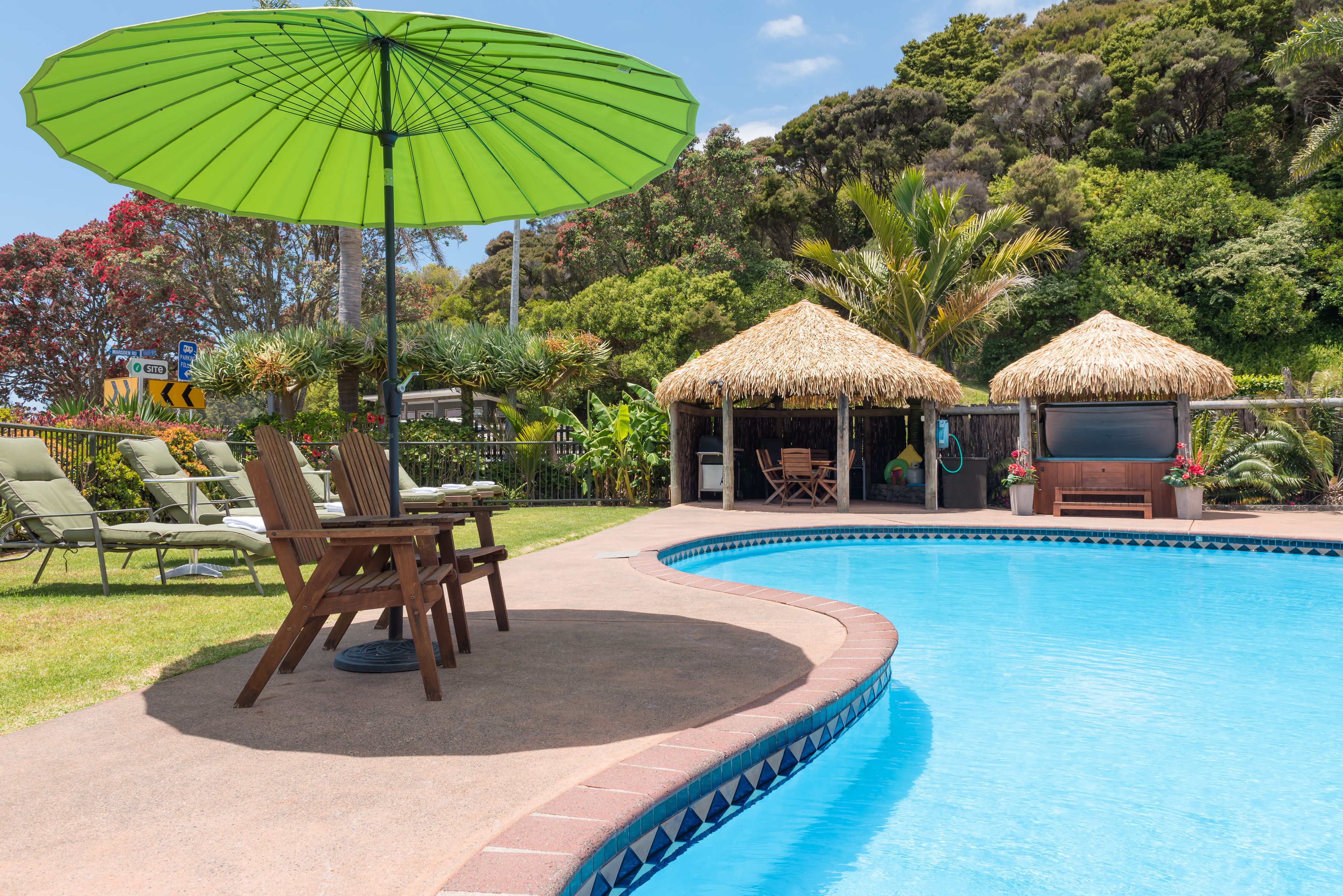 Outdoor pool, pool umbrellas, pool loungers