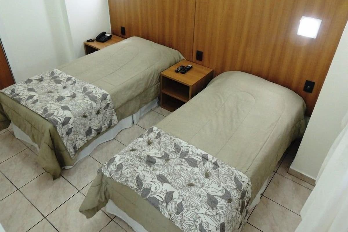 Double or Twin Room | Minibar, desk, blackout drapes, free WiFi