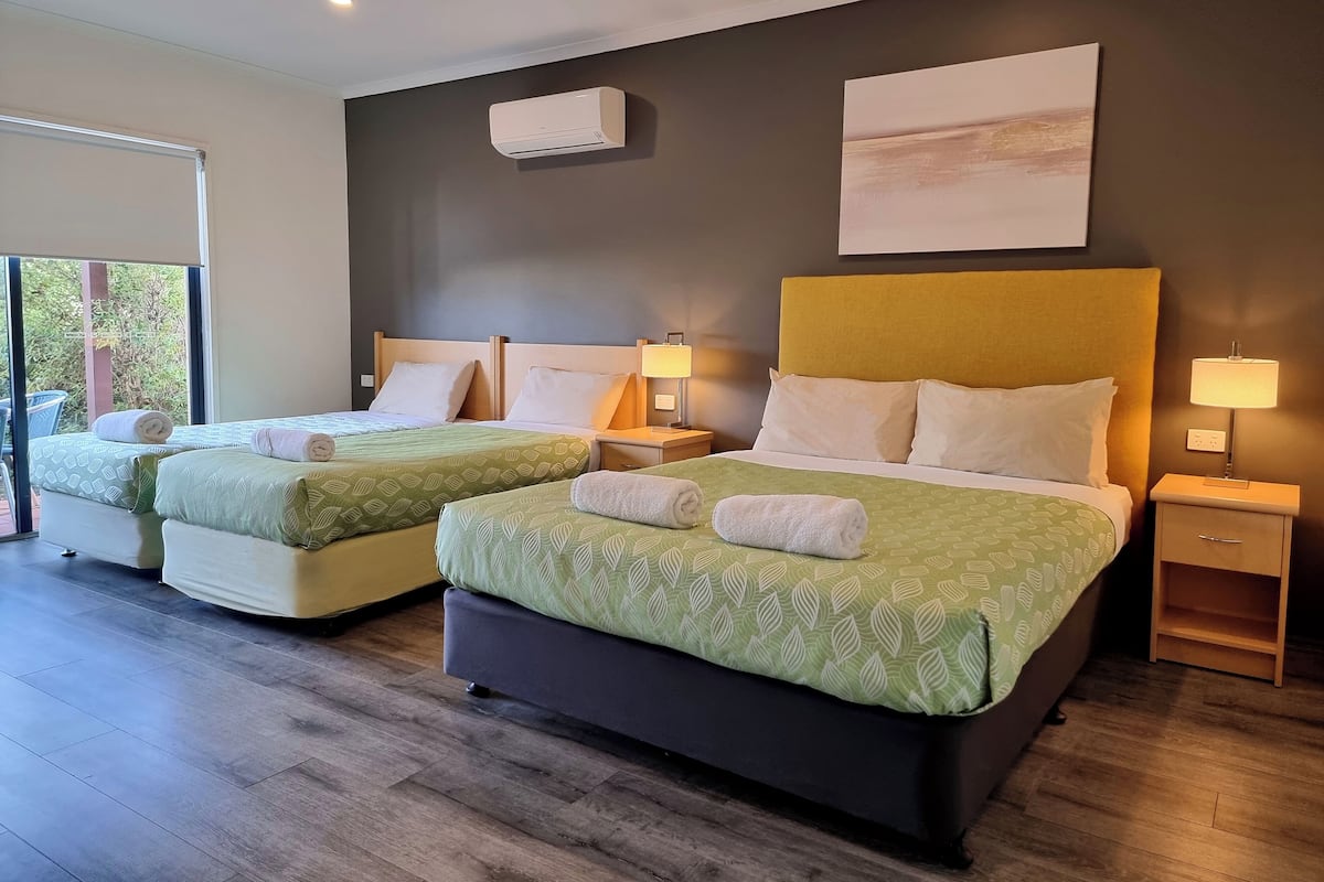 Family Studio with Patio | 1 bedroom, desk, blackout drapes, iron/ironing board