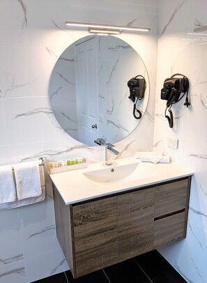 Shower, free toiletries, hair dryer, towels