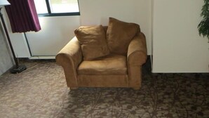 Room, 1 King Bed | Living area | TV - Amber Inn (Chicago)