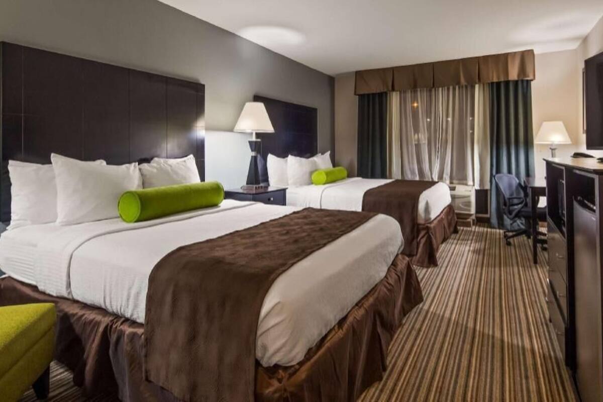 Premium bedding, pillowtop beds, desk, laptop workspace