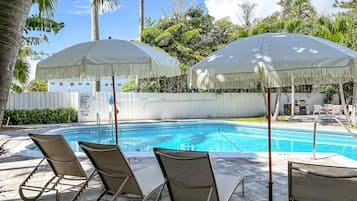 Outdoor pool, pool umbrellas, sun loungers