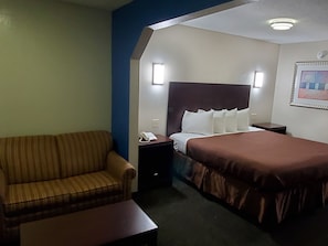 Standard Room, 1 King Bed, Smoking | Blackout drapes, iron/ironing board, free WiFi, bed sheets