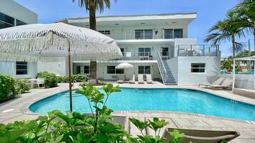 2 outdoor pools, pool umbrellas, sun loungers