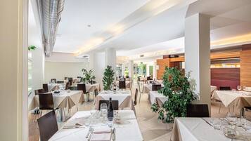 Breakfast, lunch, dinner served; international cuisine, pool views