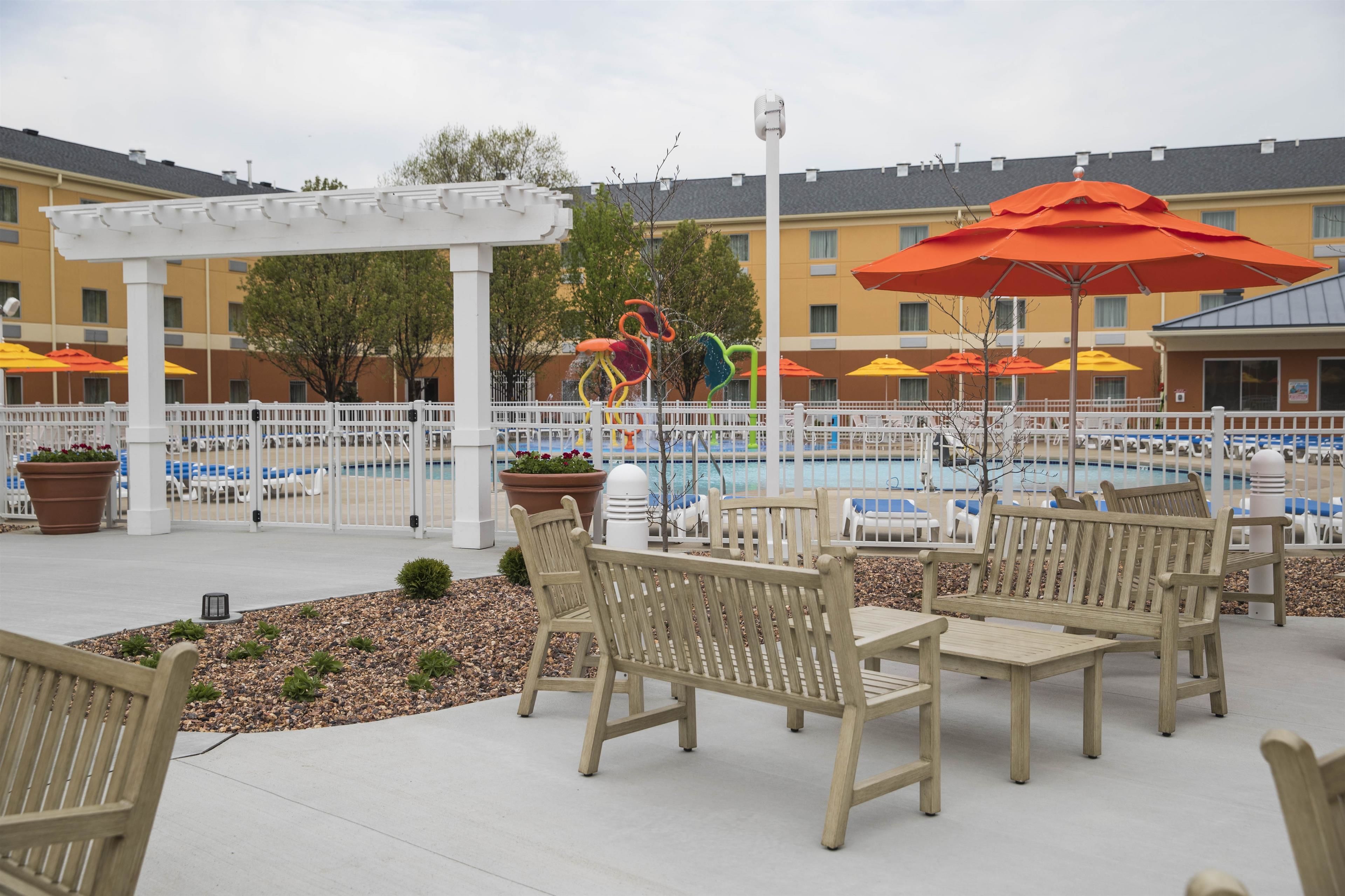 outdoor pool, pool umbrellas, pool loungers