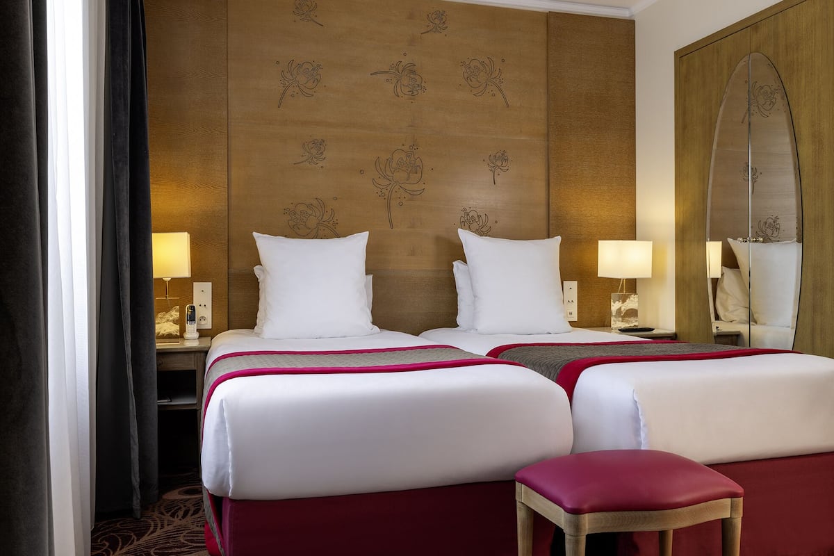 Premium bedding, pillow-top beds, in-room safe, individually decorated