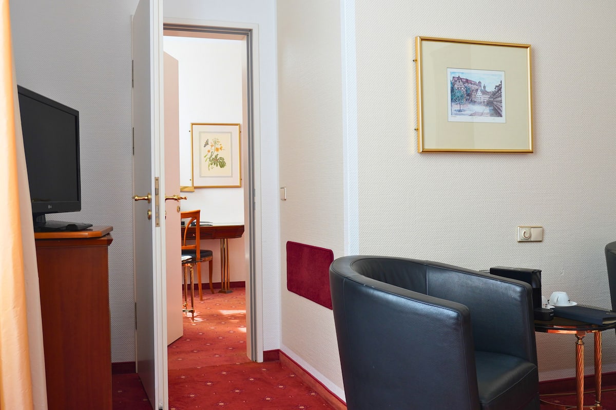 Family Room | Premium bedding, down comforters, minibar, in-room safe
