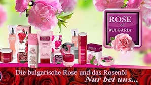 A variety of rose-themed beauty products including lip balms, oils, and soaps, with a prominent display of 'Rose of Bulgaria' branding. - Hotel am Hauptbahnhof (Schwerin)