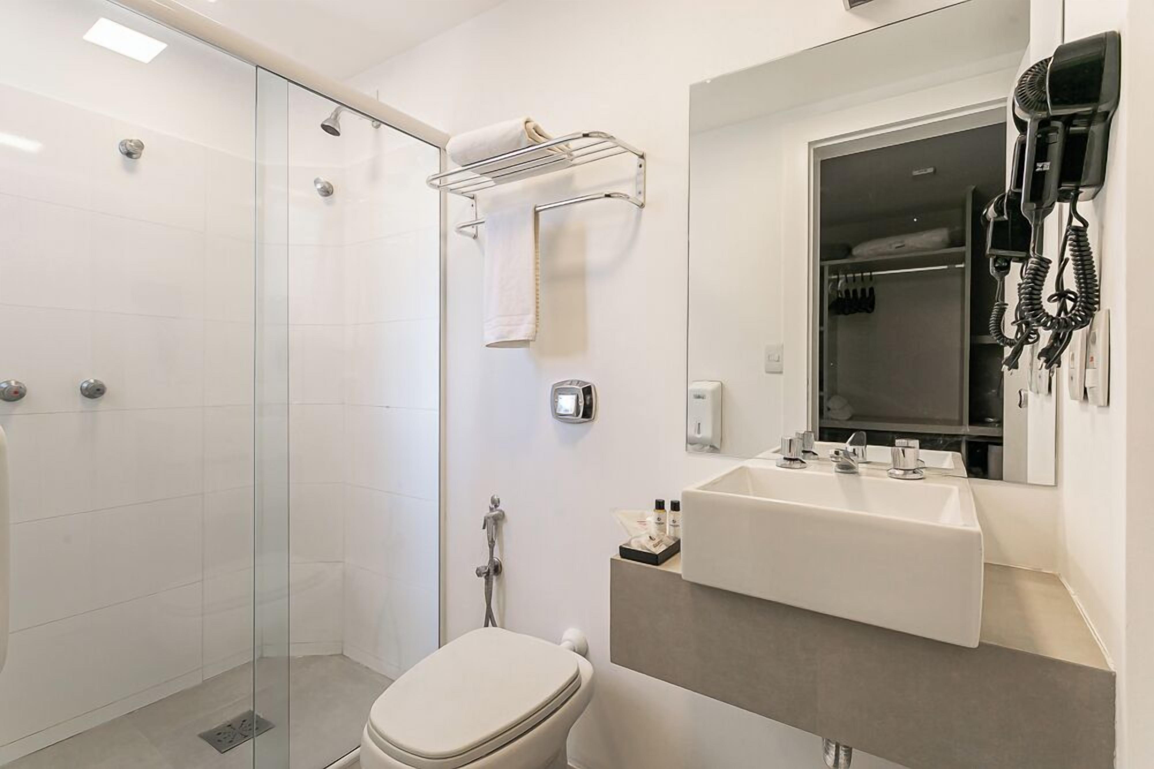 superior double room | bathroom | shower, hair dryer, towels
