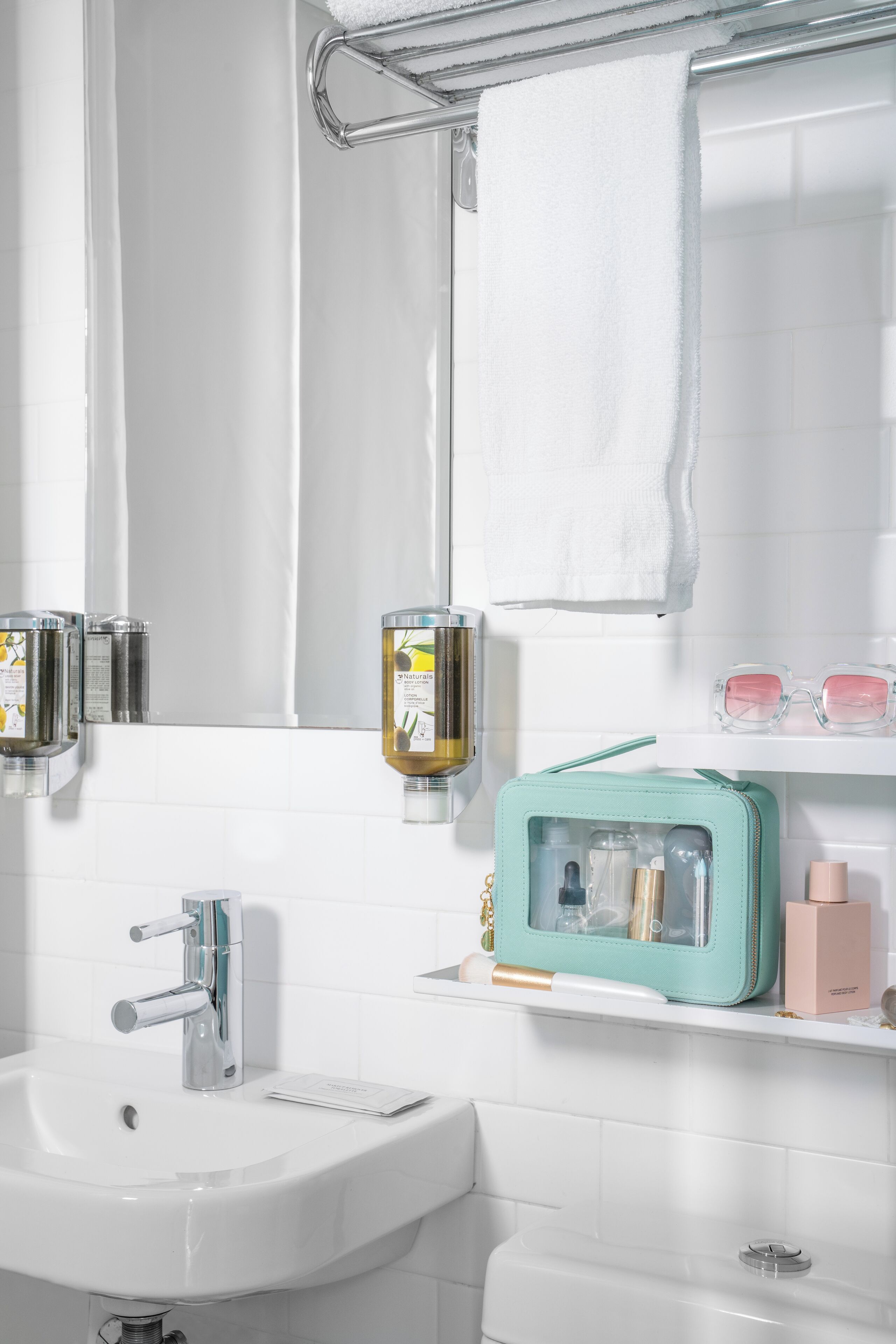 hair dryer, towels, soap, shampoo