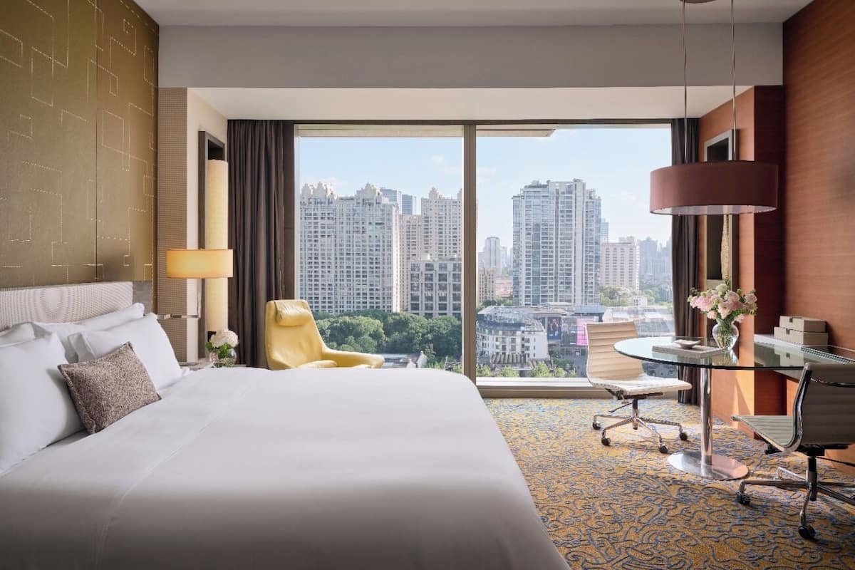 Premier King Room | Premium bedding, down comforters, in-room safe, individually decorated