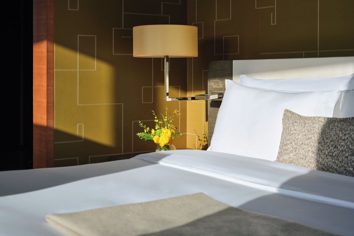 Premium bedding, down comforters, in-room safe, desk
