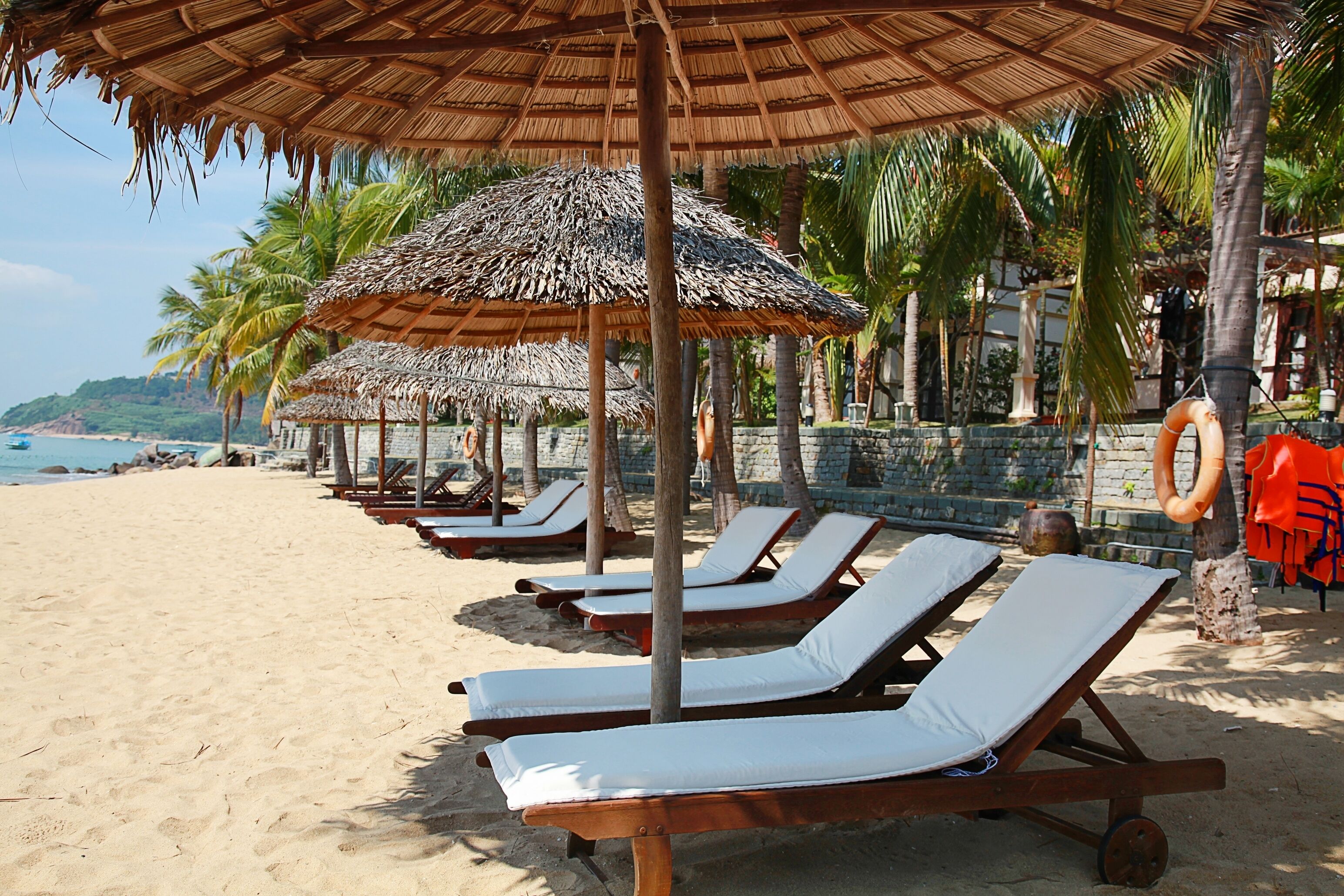 Private beach, white sand, sun-loungers, beach umbrellas