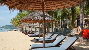 Private beach, white sand, sun-loungers, beach umbrellas