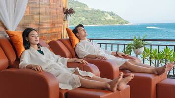 Relax on the balcony with a serene view of the tranquil body of water.