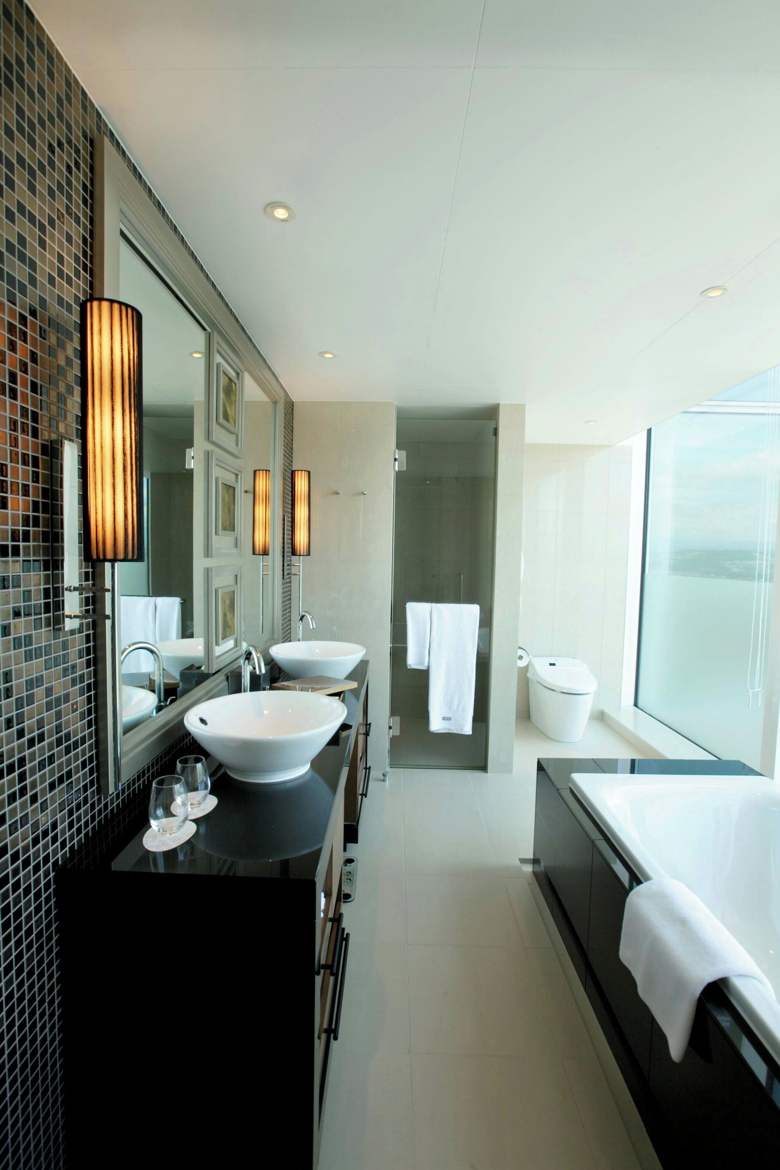 separate bathtub and shower, free toiletries, hair dryer, bathrobes