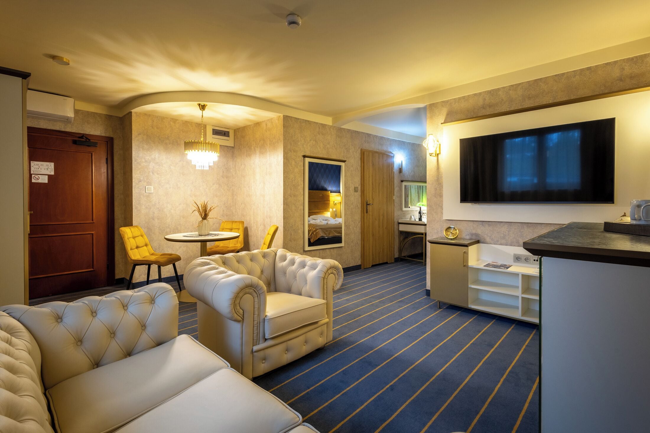 Standard Suite, 1 King Bed | Living room | LCD TV